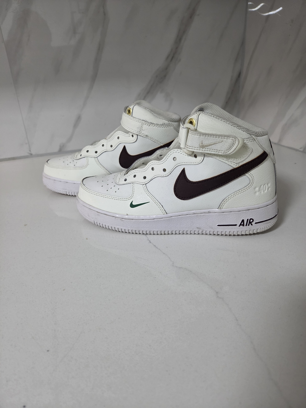 Nike Kids' White High-Top Sneakers with Dark Brown Swoosh